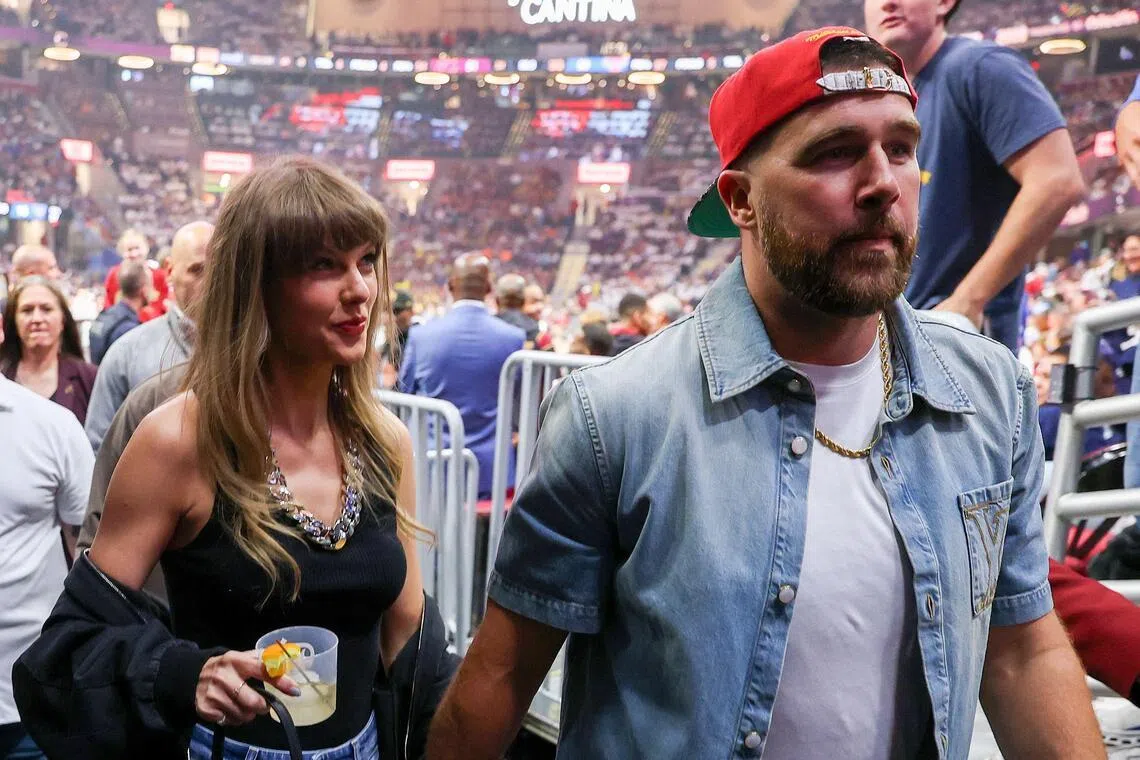 CLEVELAND, OHIO - MAY 23: (L-R) Singer Taylor Swift and Travis Kelce of the Kansas City Chiefs attend Game Three between the New York Knicks and the Cleveland Cavaliers in the NBA Eastern Conference Finals at Rocket Arena on May 23, 2026 in Cleveland, Ohio. NOTE TO USER: User expressly acknowledges and agrees that, by downloading and or using this photograph, User is consenting to the terms and conditions of the Getty Images License Agreement.   Gregory Shamus/Getty Images/AFP (Photo by Gregory Shamus / GETTY IMAGES NORTH AMERICA / Getty Images via AFP)