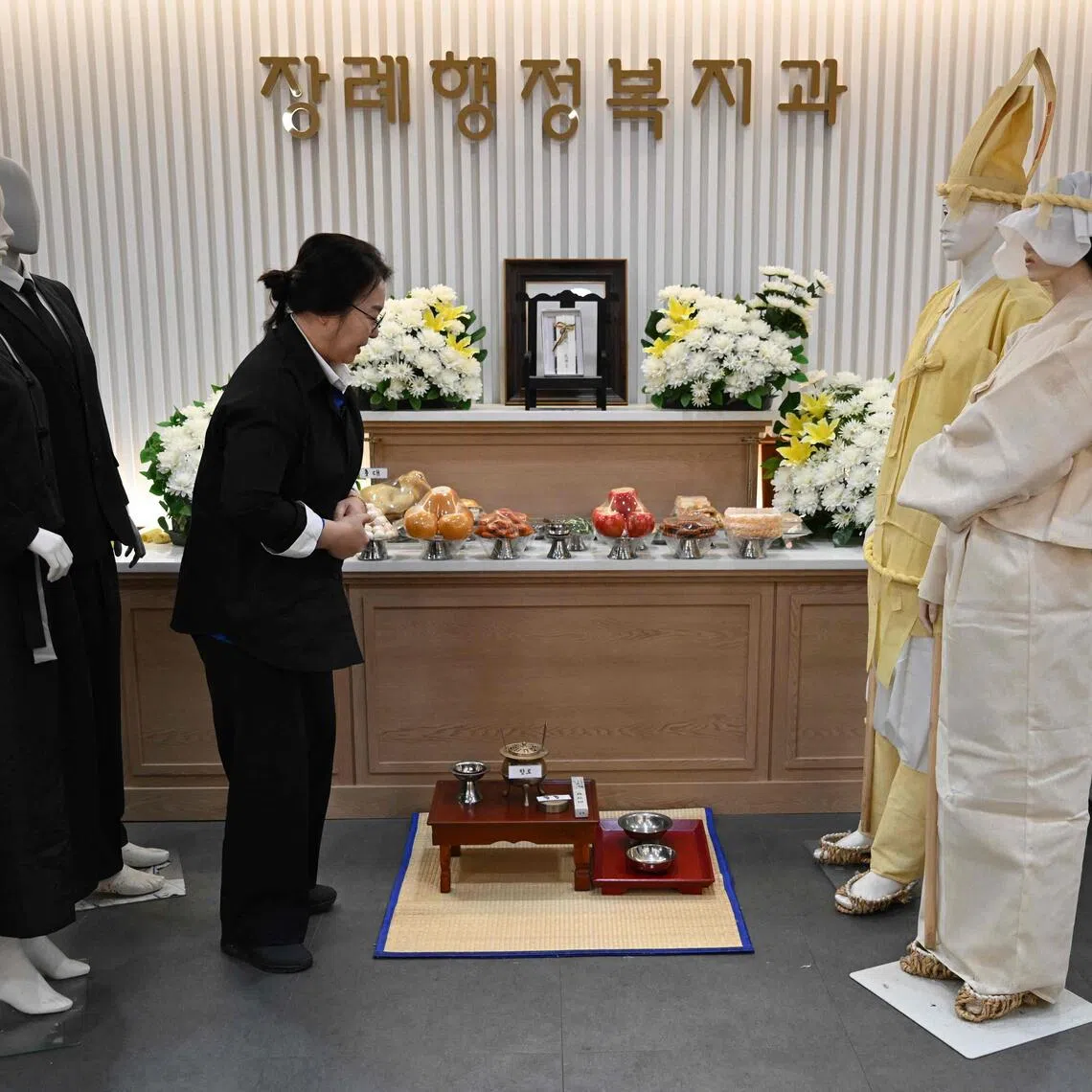 Growing numbers are finding work in the business of death as South Korea undergoes massive demographic change, with birth rates among the lowest in the world.