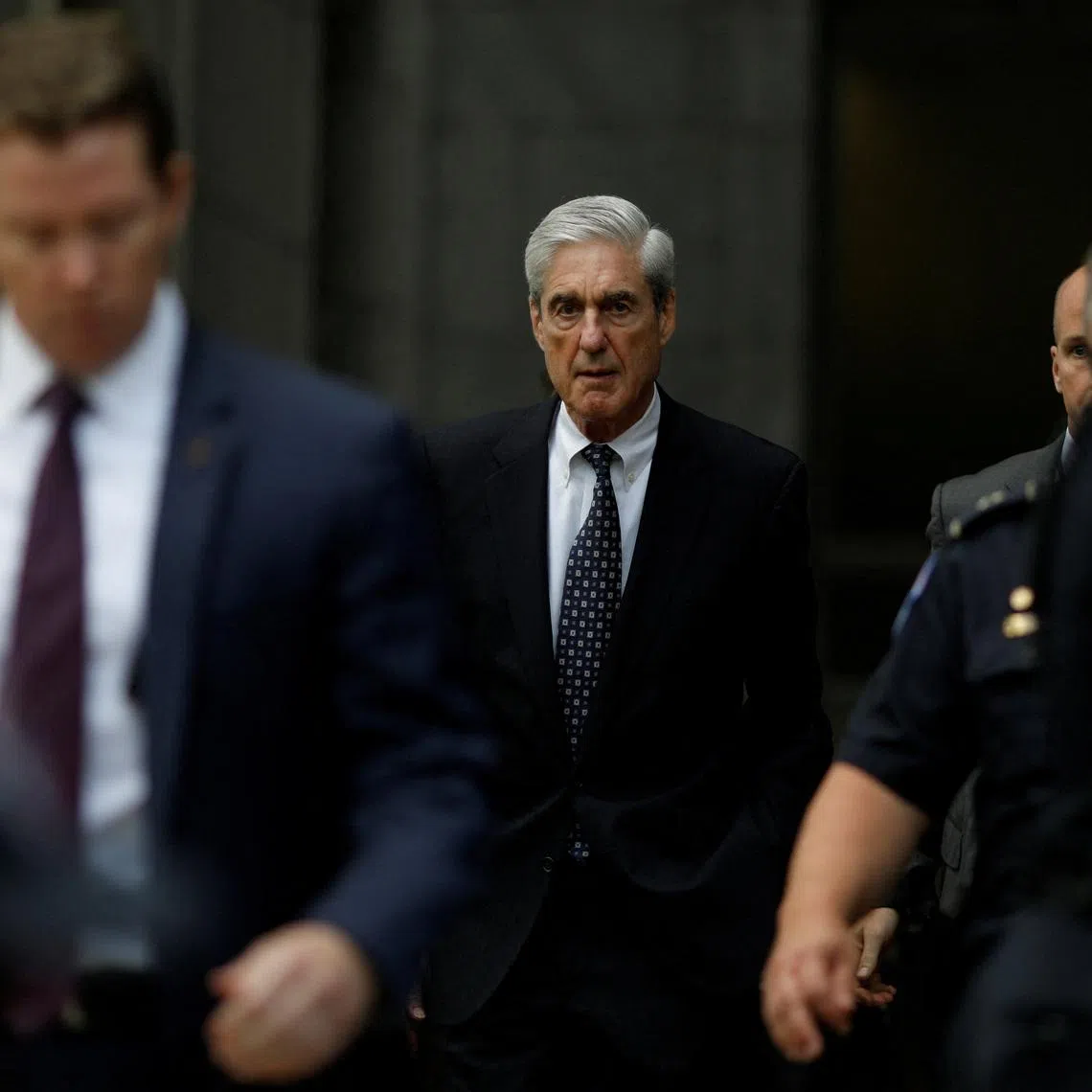FILE PHOTO: Former Special Counsel Robert Mueller departs from the U.S. Capitol following his testimonies before the House of Representatives, on Capitol Hill in Washington, U.S. July 24, 2019. REUTERS/Tom Brenner/File Photo
