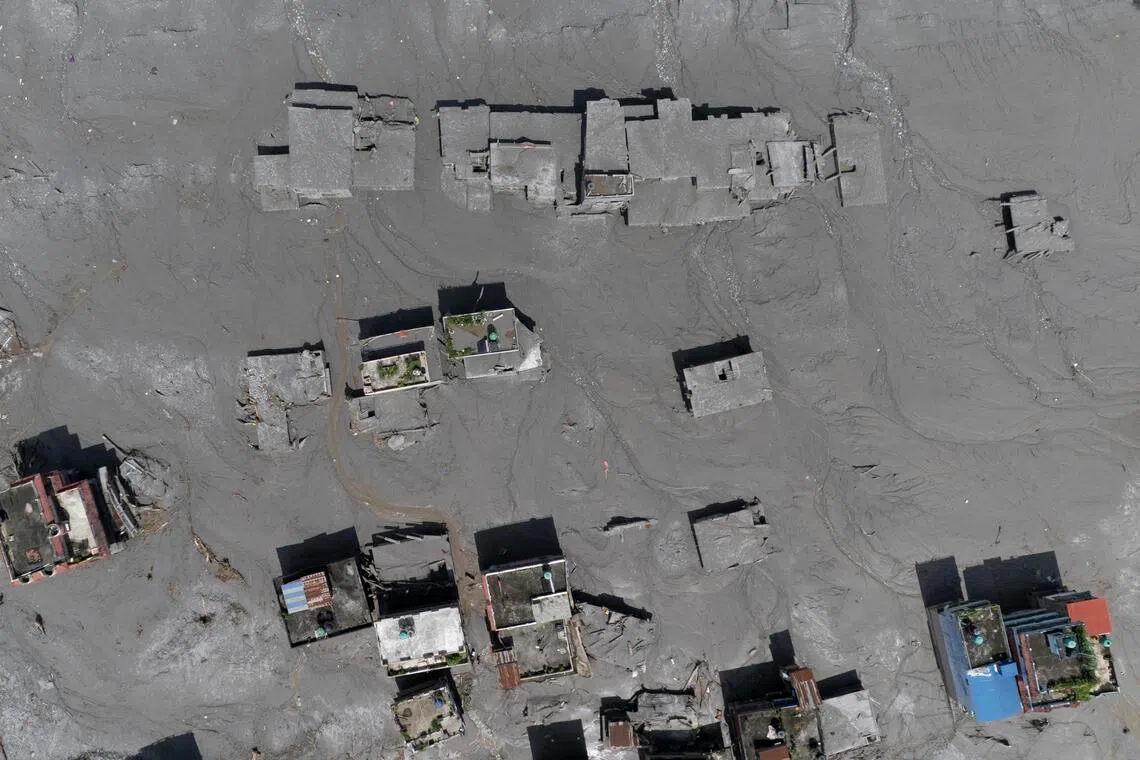 An aerial view of damaged homes in Delight village following a flash flood in Nuwakot district in Nepal on Aug 27.