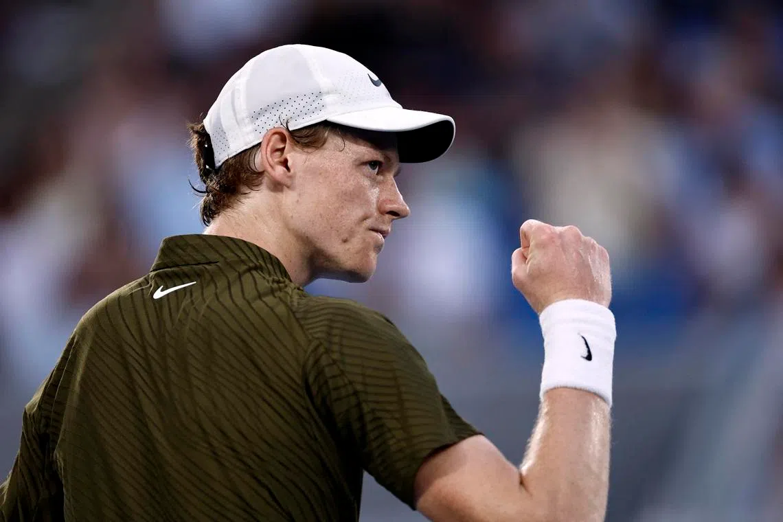 Tennis - Australian Open - Melbourne Park, Melbourne, Australia - January 26, 2026 Italy's Jannik Sinner reacts during his fourth round match against Italy's Luciano Darderi REUTERS/Tingshu Wang