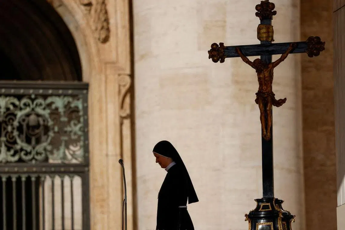 FILE PHOTO: A nun attends the weekly general audience in Saint Peter's Square at the Vatican, October 11, 2023. REUTERS/Remo Casilli/File Photo