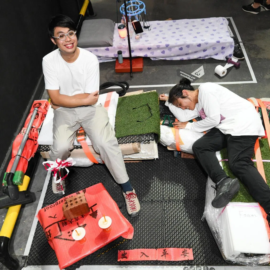 Using discarded materials from Tanjong Pagar Distripark, Hans Chew, 28, and Jun Tan, 39, created Dara-Dara, a lounge area that included a modular L-shape sofa to show how such items can have a second life. The work responds to the site as both a logistics hub and an emerging arts space, where a lot of materials and labour go into setting up exhibitions. Over the hour, they moved, wrapped, strapped, and secured the materials, echoing the site’s logistical operations and paying homage to the often invisible labour behind every successful exhibition. During their site visits, they noticed the large amount of material thrown away and began considering how it could be reused. On Oct 3, they were among nine teams gathered at Tanjong Pagar Distripark — where the Singapore Art Museum is currently located — to compete in transforming a 1.5m by 2m space into a cosy rest area. Within an hour, the teams built their own spaces. Three prizes were awarded, and the duo won the Programmer’s Award, earning a showcase for their work at SAM.