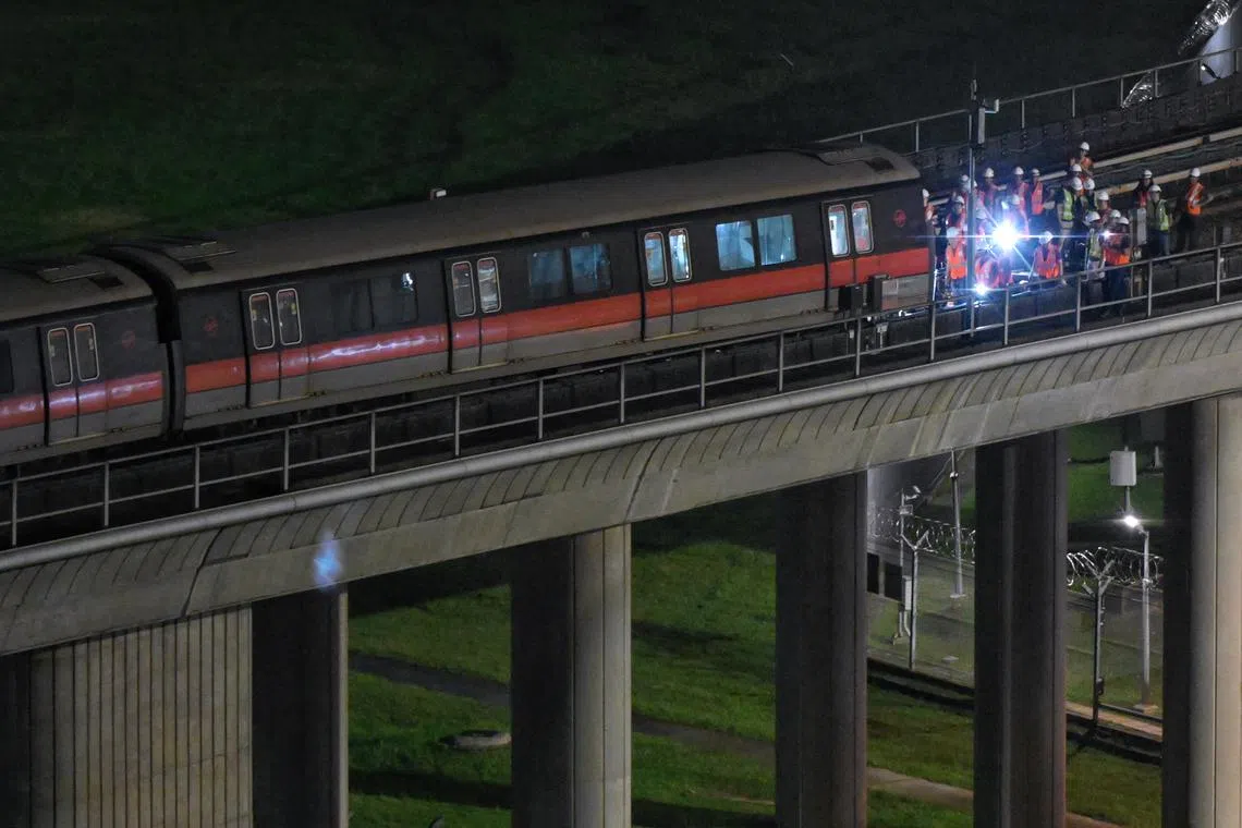 Work continuing into the night on the affected train and train track right outside Ulu Pandan Depot, at 7.45pm on Sept 25, 2024.