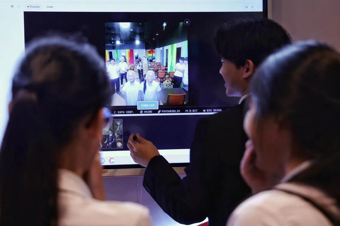 Students reacting to an AI-generated picture of themselves in old age during a Generative AI workshop in the AI Living Lab at ITE College East on Feb 4.