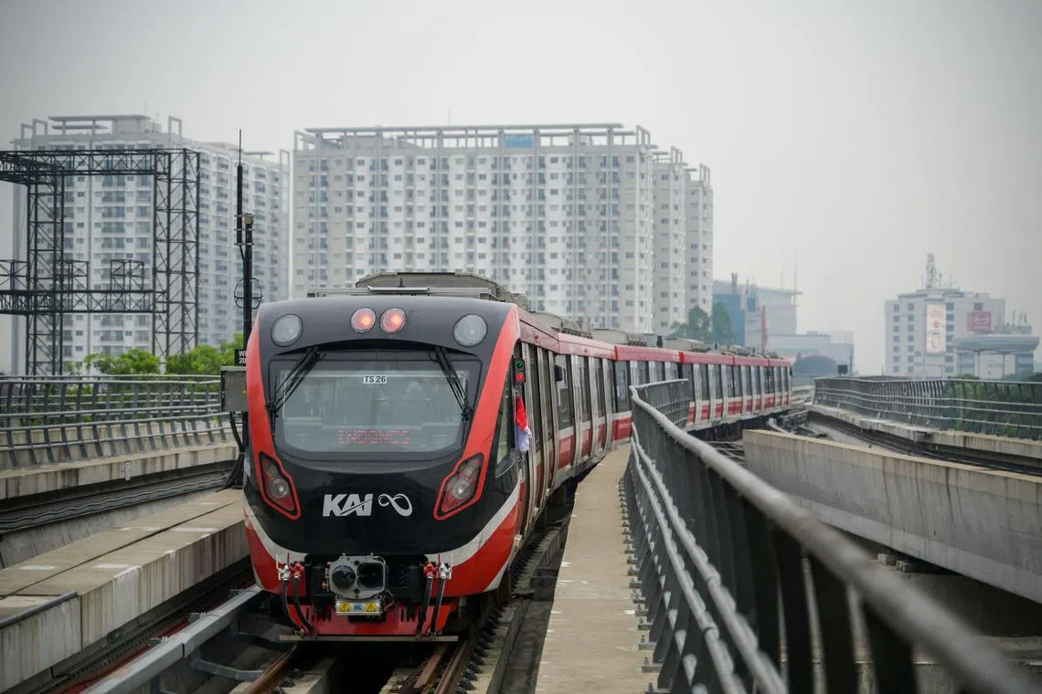 A series of LRT (Light Rail Transit) carriages carrying President Joko Widodo leaves Cawang station in Jakarta on Monday, shortly after its inauguration for public transportation. 