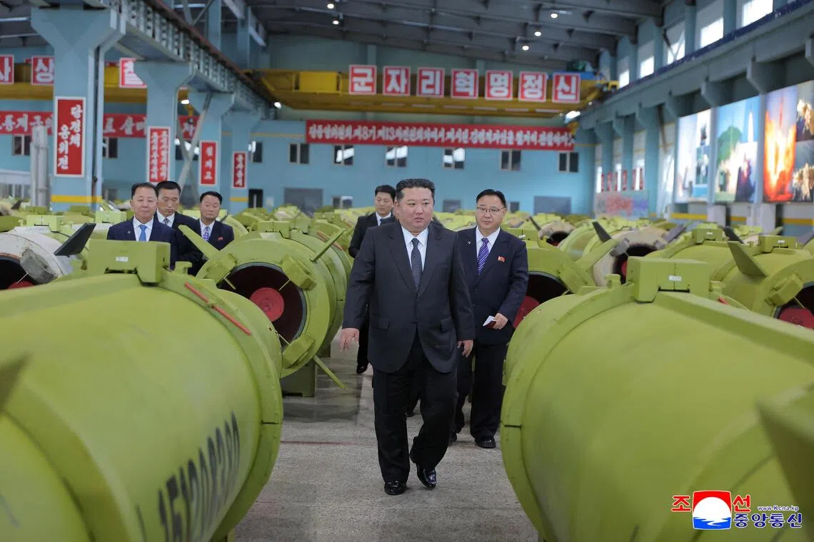 North Korean leader Kim Jong Un visits major munitions enterprises, according to state media KCNA on Dec 26.