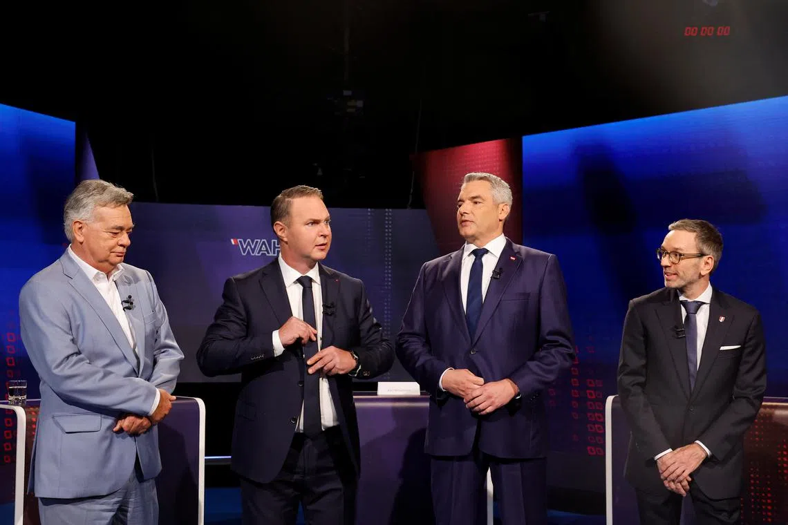 Austrian Chancellor and Head of People's Party (OEVP) Karl Nehammer, Vice-Chancellor and Head of Green Party Werner Kogler, Austria's Freedom Party (FPOe) leader and top candidate Herbert Kickl, and head of Social Democrats (SPOe) Andreas Babler attend the last TV discussion before Austrian general elections on Sunday, in Vienna, Austria, September 26, 2024. REUTERS/Lisa Leutner/File Photo