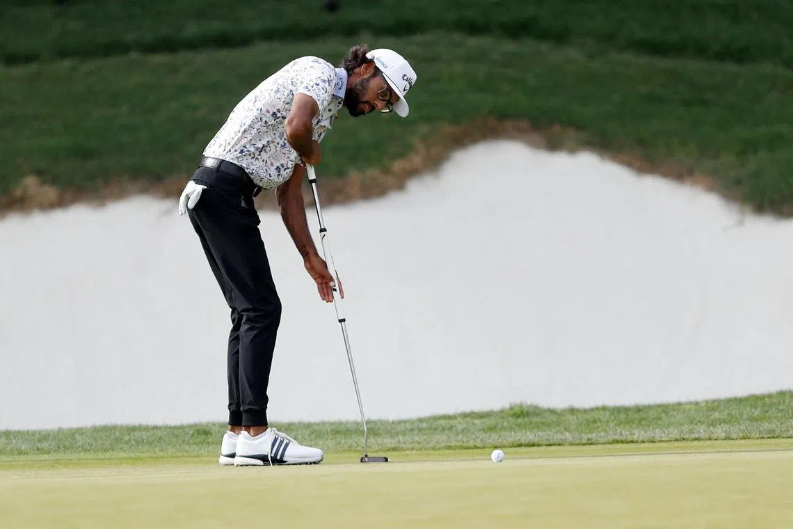 Leader Akshay Bhatia of the United States playing his putt shot on the 18th hole during the third round of the PGA Texas Open at TPC San Antonio on April 6 in San Antonio.