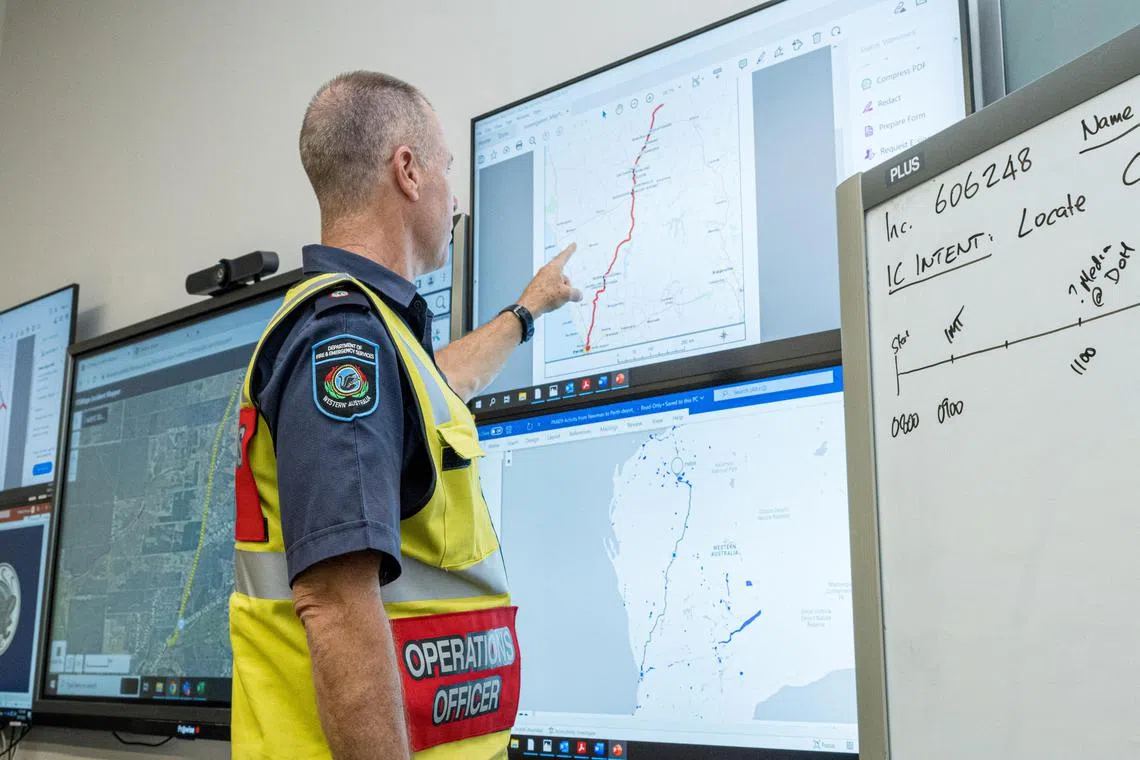A member of the Incident Management Team coordinates the search for the lost radioactive capsule by a contractor hired by Rio Tinto. 