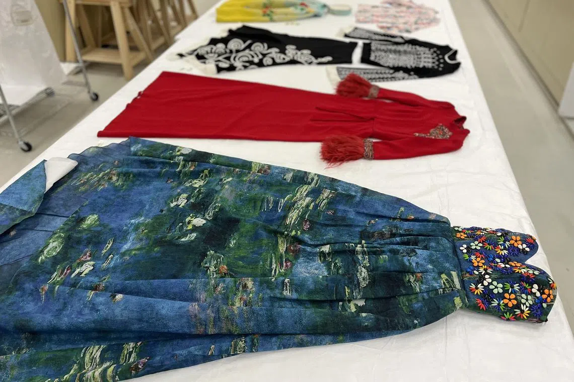 Singaporean fashion designer Andrew Gn's works in the process of being conserved at the Heritage Conservation Centre.