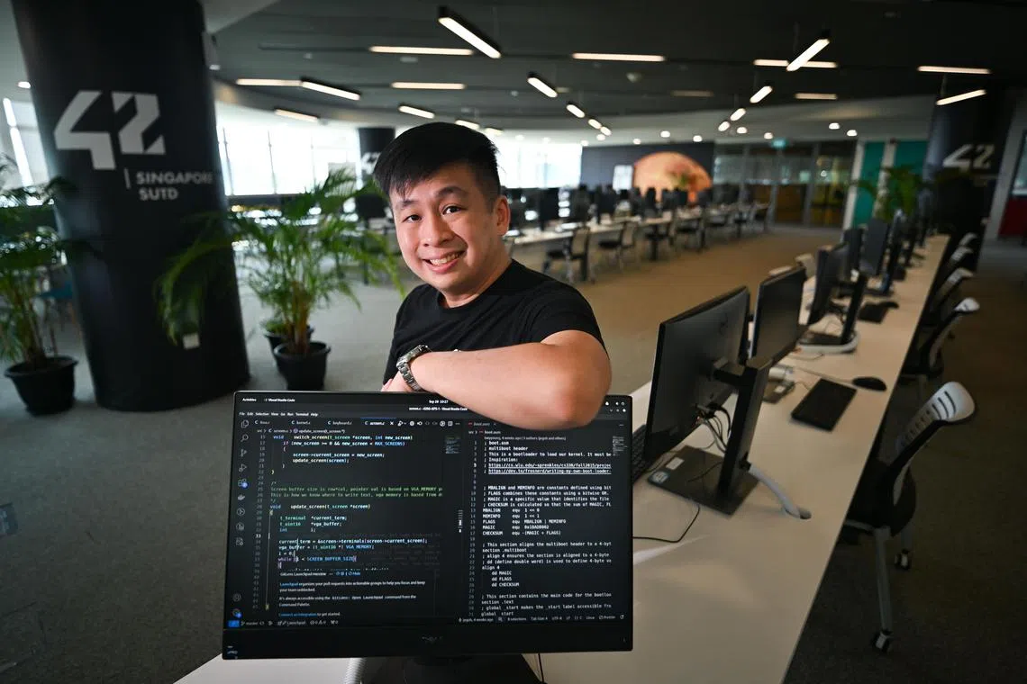 ST20240928-202488800725-Lim Yaohui-Elisha Tushara-etsutd/
Mr Brian Young, 35, Cybersecurity Engineer at DSTA, at the 42 Singapore lab in SUTD on Sept 28, 2024.
Brian Young is the only Singaporean to complete all 21 modules in one of the most rigorous coding courses at École 42, a private computer programming school in Paris, where only 1 percent of applicants are accepted.
Following the same principles of École 42, in Sep 2023 SUTD offered the 42 SG programme, where there are no tuition fees, formal lessons, textbooks or teachers. Students learn at their own pace advancing stage-by-stage through project-based learning, peer-to-peer learning and gamification.
(ST PHOTO: LIM YAOHUI)