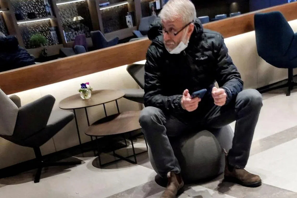 Sanctioned Russian oligarch Roman Abramovich sits in a VIP lounge at Ben Gurion international airport in Lod near Tel Aviv, Israel, March 14, 2022. REUTERS/Stringer/File Photo