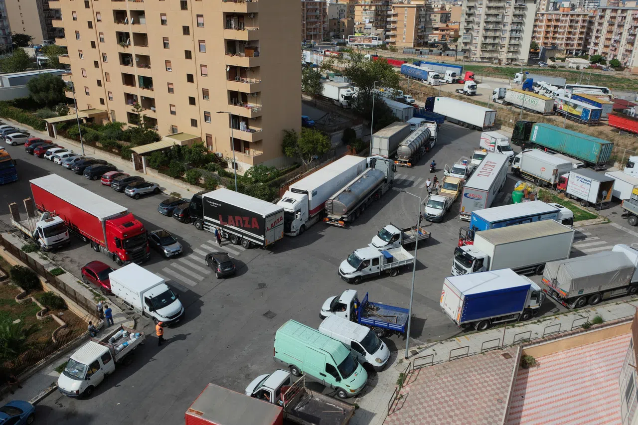 Truck drivers blocking streets in Palermo, Italy on Oct 20. Protests over soaring fuel and transport costs are disrupting supply chains across Sicily and southern Italy.