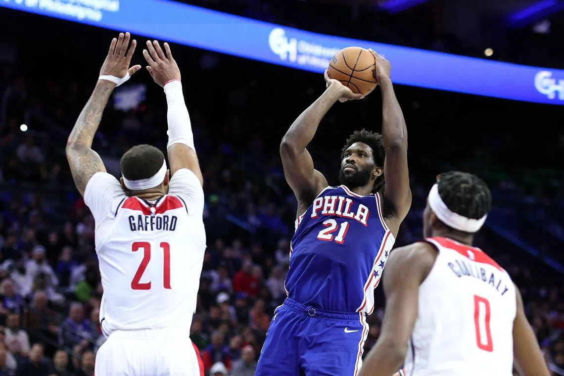Joel Embiid of the Philadelphia 76ers shoots over Daniel Gafford of the Washington Wizards during the third quarter at the Wells Fargo Centre.