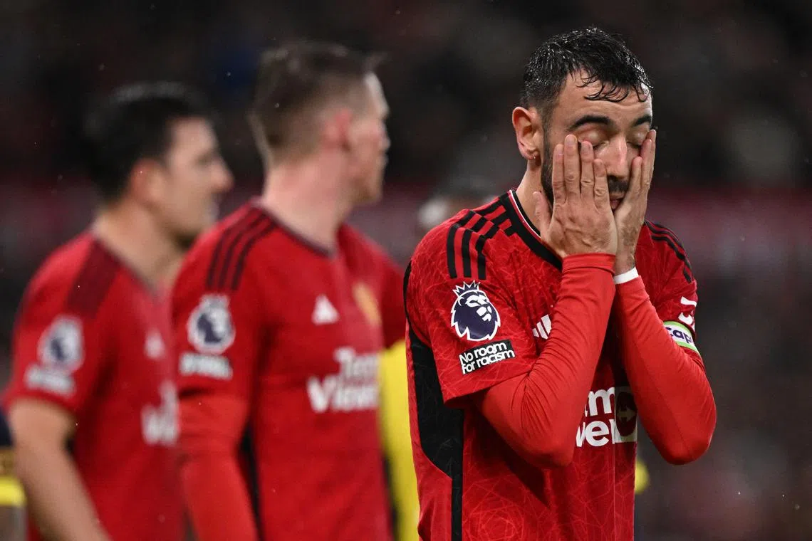Manchester United captain Bruno Fernandes (right) picked up a fifth booking of the season and will be suspended for next weekend’s trip to Liverpool.