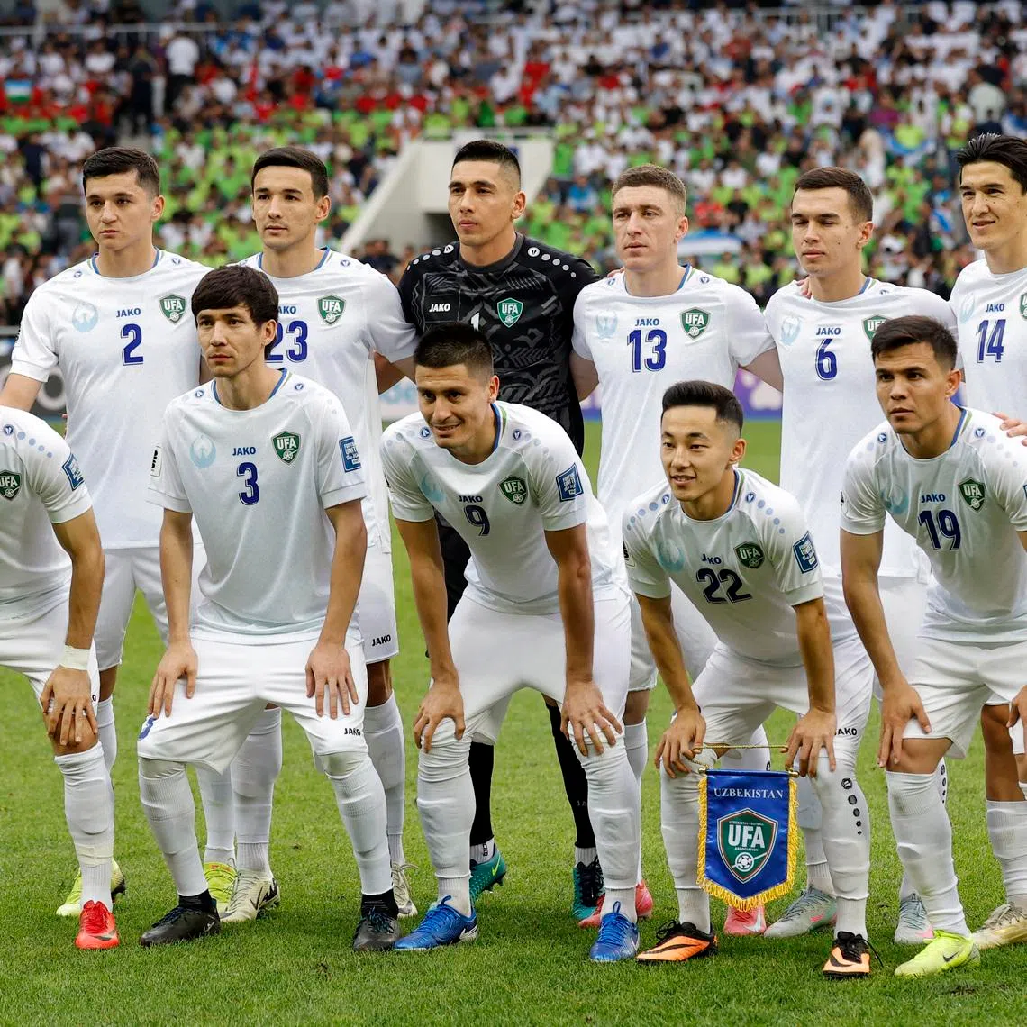 Soccer Football - World Cup - AFC Qualifiers - Group A - Uzbekistan v Qatar - Milliy Stadium, Tashkent, Uzbekistan - June 10, 2025 Uzbekistan players pose for a team group photo before the match REUTERS/Maxim Shemetov