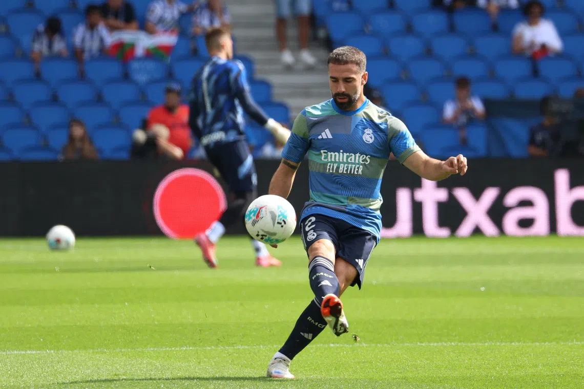 FILE PHOTO: Soccer Football - LaLiga - Real Sociedad v Real Madrid - Reale Arena, San Sebastian, Spain - September 13, 2025 Real Madrid's Dani Carvajal during the warm up before the match REUTERS/Pankra Nieto/File Photo