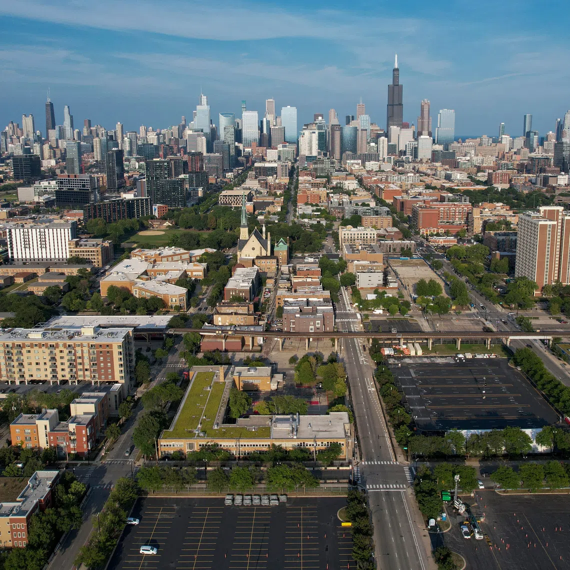 A drone picture shows the Chicago skyline in Chicago, Illinois, U.S. August 14, 2024.  REUTERS/Vincent Alban