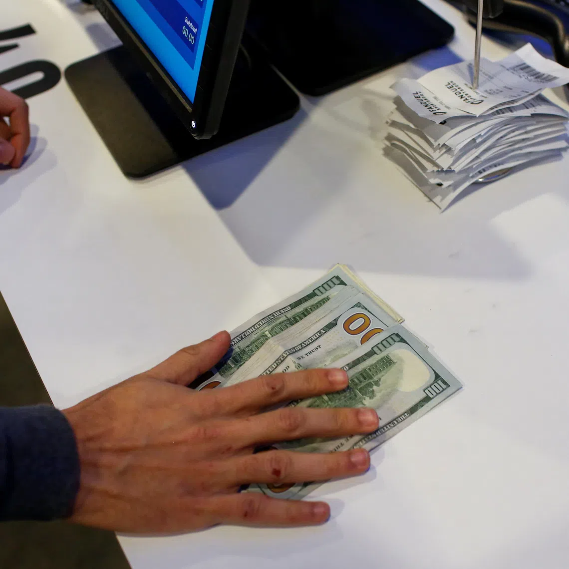 A man makes his bets during the Super Bowl LIII in East Rutherford, New Jersey, U.S., February 3, 2019. REUTERS/Eduardo Munoz/File Photo