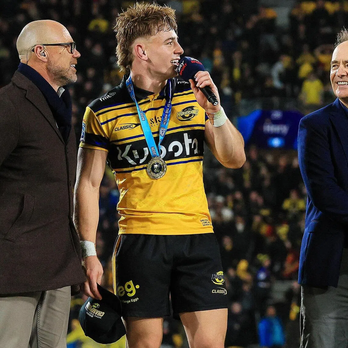 Hurricanes' Ruben Love speaks after receiving the Player of the Match medal following his team's victory in the Super Rugby Pacific final match between the Wellington Hurricanes and Waikato Chiefs in Wellington on June 20, 2026. (Photo by Grant Down / AFP)