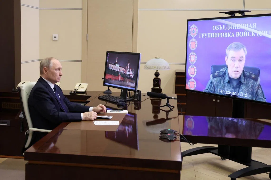 Russian President Vladimir Putin listens to a report of Chief of the General Staff of Russian Armed Forces Valery Gerasimov via video link at the Novo-Ogaryovo state residence outside Moscow, Russia April 26, 2025. Sputnik/Alexander Kazakov/Pool via REUTERS
