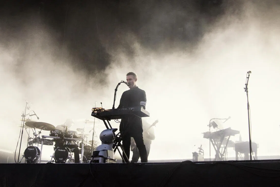 Massive AttackÕs Robert Del Naja performs during ACT 1.5 at Clifton Downs, in Bristol, England, on Aug. 25, 2024. The daylong 35,000-person festival showcased the carbon-cutting measures Massive Attack have developed with the Tyndall Center for Climate Change Research, a British organization, and A Greener Future, a nonprofit focused on lowering the music industryÕs emissions. (Sandra Mickiewicz/The New York Times)