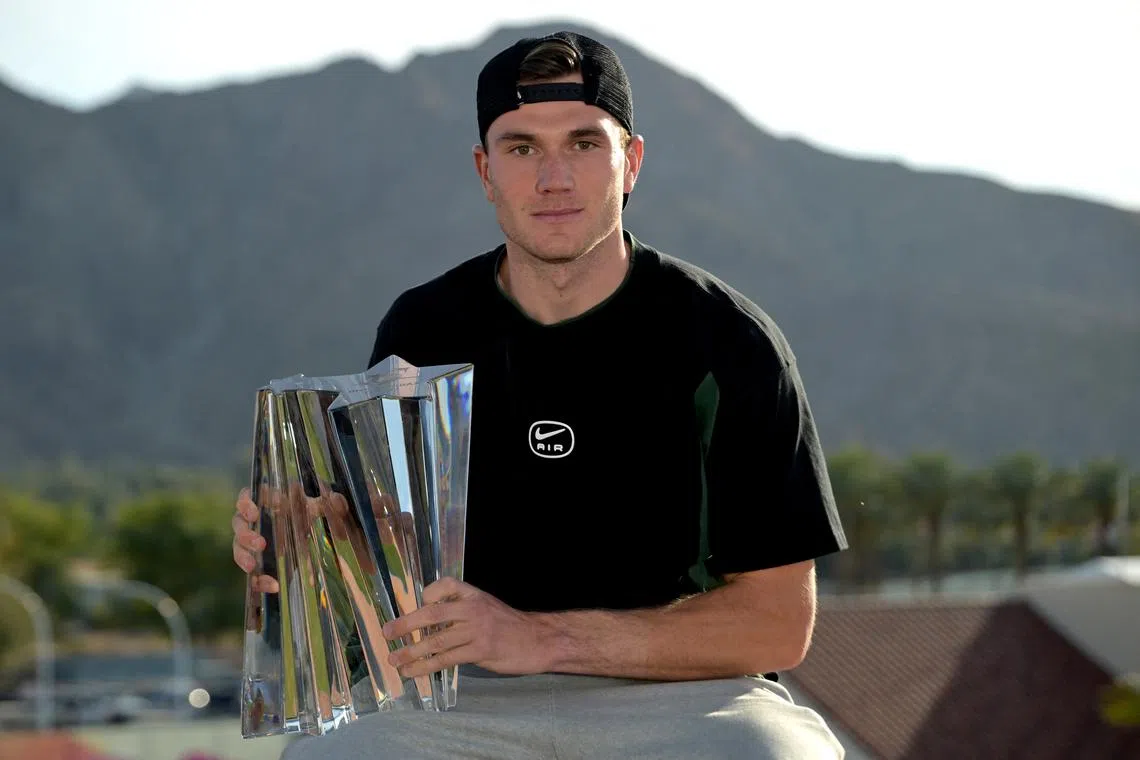 Mar 16, 2025; Indian Wells, CA, USA;  Jack Draper (GBR) holds the championship trophy after defeating Holger Rune (not pictured) in the final of the BNP Paribas Open at the Indian Well Tennis Garden. Jayne Kamin-Oncea-Imagn Images/File Photo
