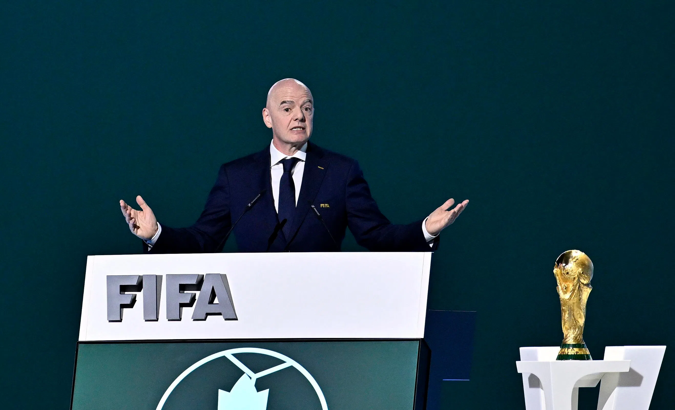 Soccer Football - 76th FIFA Congress - Vancouver Convention Centre, Vancouver, Canada - April 30, 2026  FIFA President Gianni Infantino speaks during the congress as the FIFA World Cup Trophy is seen REUTERS/Jennifer Gauthier