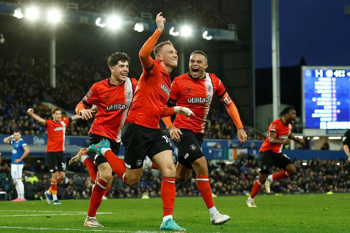 Soccer Football -  FA Cup - Fourth Round - Everton v Luton Town - Goodison Park, Liverpool, Britain - January 27, 2024 Luton Town's Cauley Woodrow celebrates scoring their second goal with Carlton Morris Action Images via Reuters/Jason Cairnduff