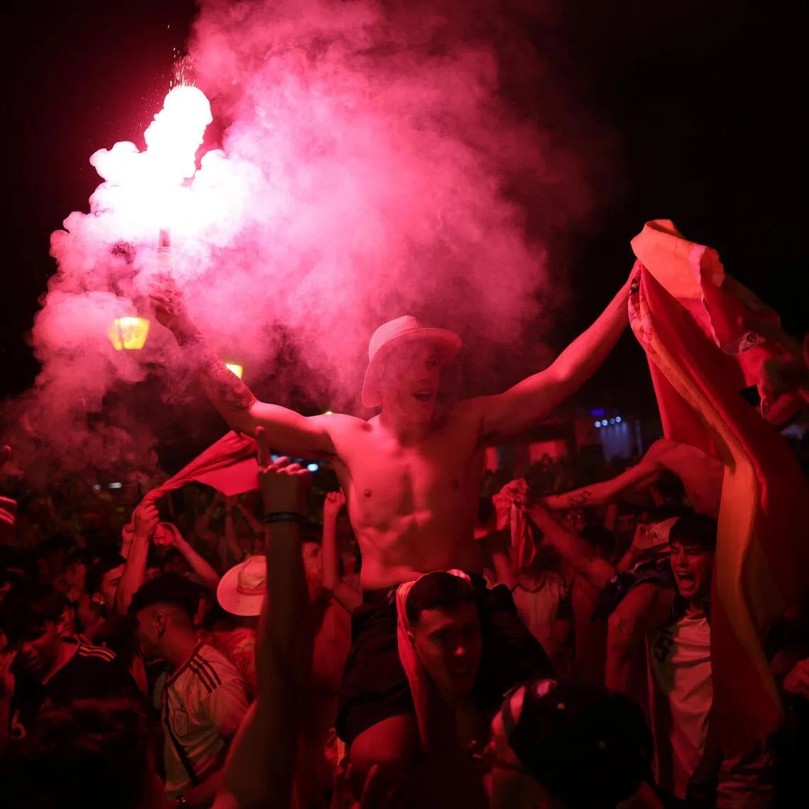 Spain fans celebrating after their side beat Argentina 1-0 to win the World Cup for a second time on July 19.
