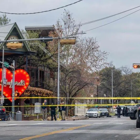 Members of the FBI and local law enforcement investigate after a mass shooting outside of Buford's bar in downtown on March 01, 2026 in Austin, Texas.