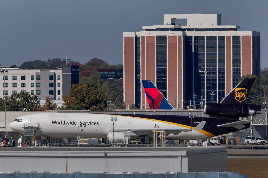 A United Parcel Service (UPS) MD11 cargo jet is parked at Hartsfield-Jackson Atlanta International Airport in Atlanta, Georgia, USA, on Nov 5, 2025.