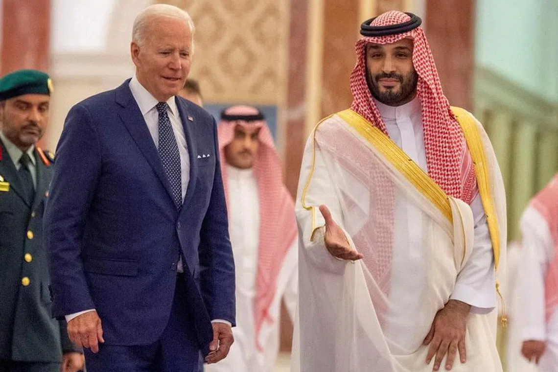 FILE PHOTO: Saudi Crown Prince Mohammed bin Salman receives U.S. President Joe Biden at Al Salman Palace upon his arrival in Jeddah, Saudi Arabia, July 15, 2022. Bandar Algaloud/Courtesy of Saudi Royal Court/Handout via REUTERS/File Photo