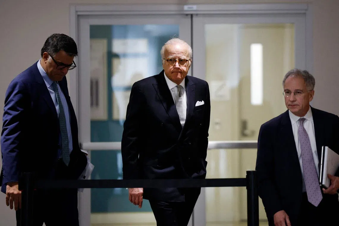 Mr James Biden, the brother of US President Joe Biden, returns from a break in the Washington closed-door hearing, with his attorney Paul Fishman (right).