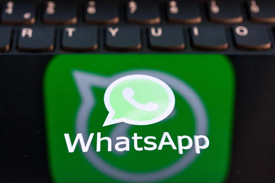 This illustration photograph taken on April 11, 2023, shows the US instant messaging software Whatsapp's logo on a smartphone screen in Moscow. (Photo by Kirill KUDRYAVTSEV / AFP)