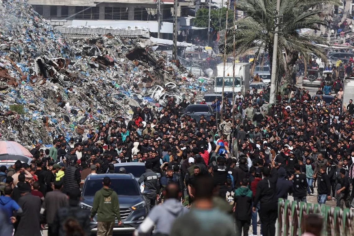 Mourners attend the funeral of Palestinians killed in an Israeli strike, according to medics, in Gaza City, March 28, 2026. REUTERS/Dawoud Abu Alkas