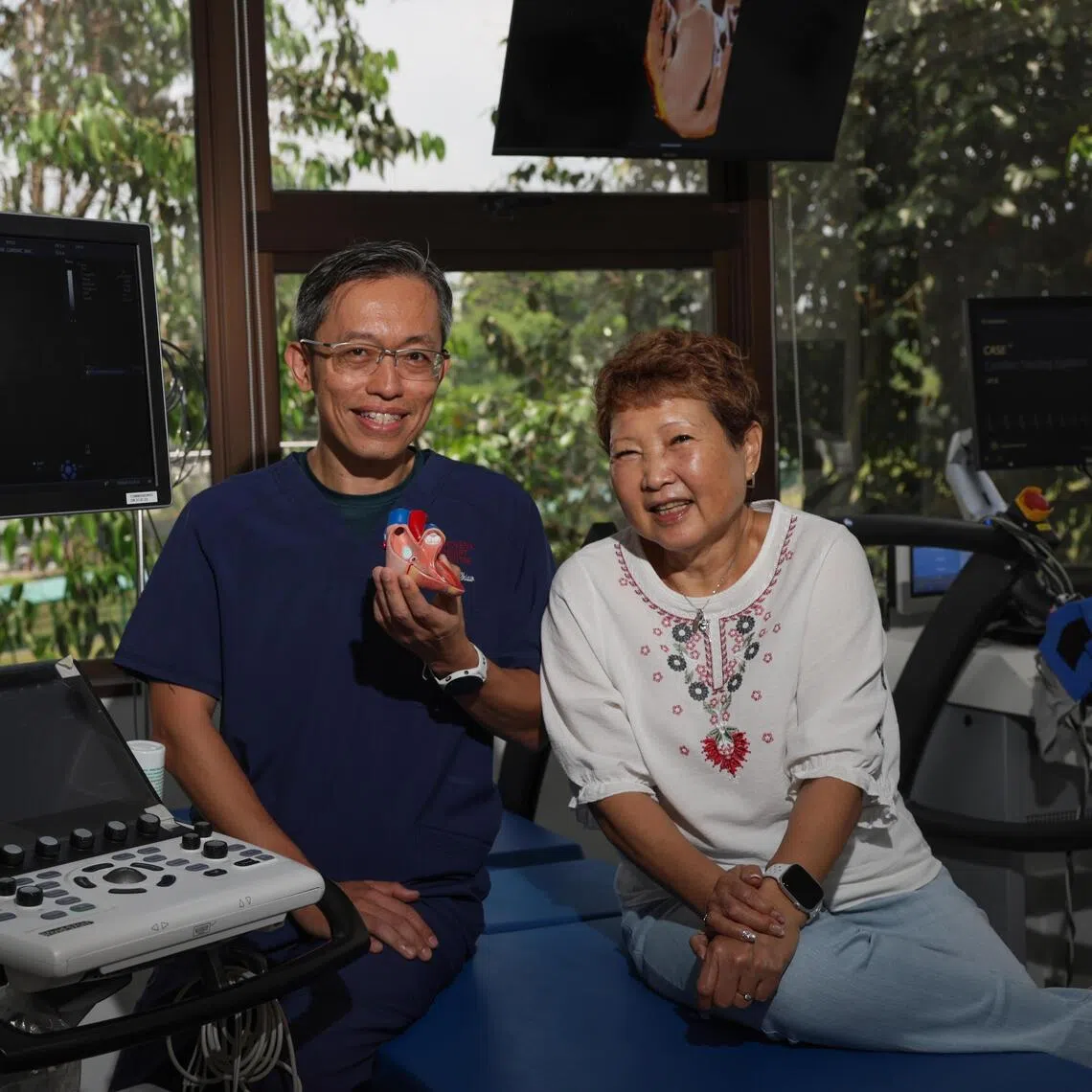 Cardiologist Tang Hak Chiaw and his patient Christina Chua, who has the genetic heart condition hypertrophic cardiomyopathy.