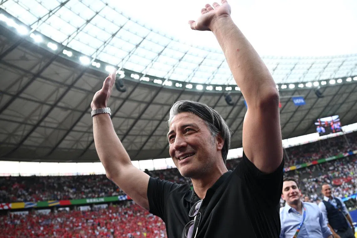 FILE PHOTO: Soccer Football - Euro 2024 - Round of 16 - Switzerland v Italy - Berlin Olympiastadion, Berlin, Germany - June 29, 2024  Switzerland coach Murat Yakin celebrates after the match REUTERS/Annegret Hilse/File Photo