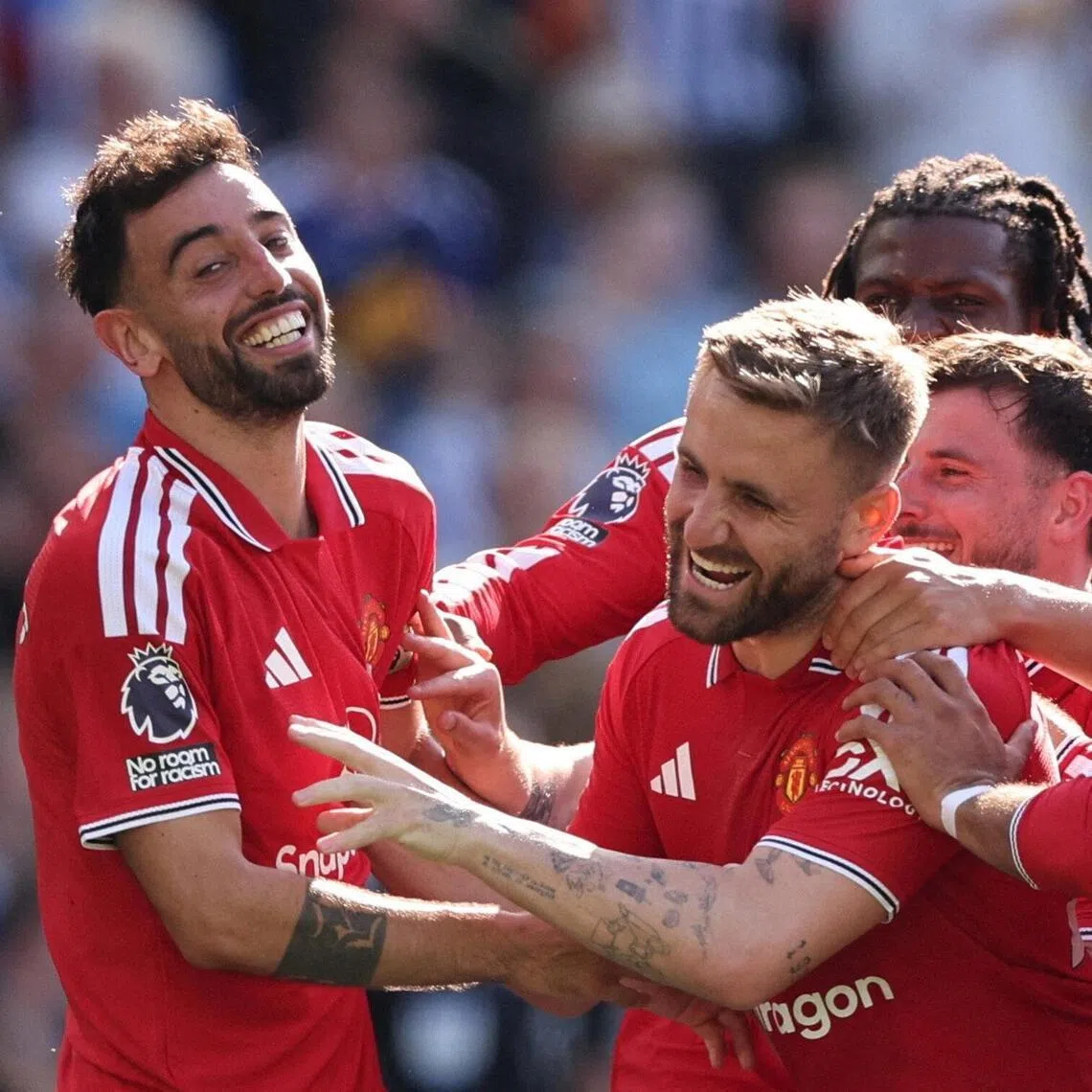 Manchester United's Bruno Fernandes (left) celebrates scoring their third goal with Luke Shaw, Bryan Mbeumo, Mason Mount and Patrick Dorgu after a VAR review.
