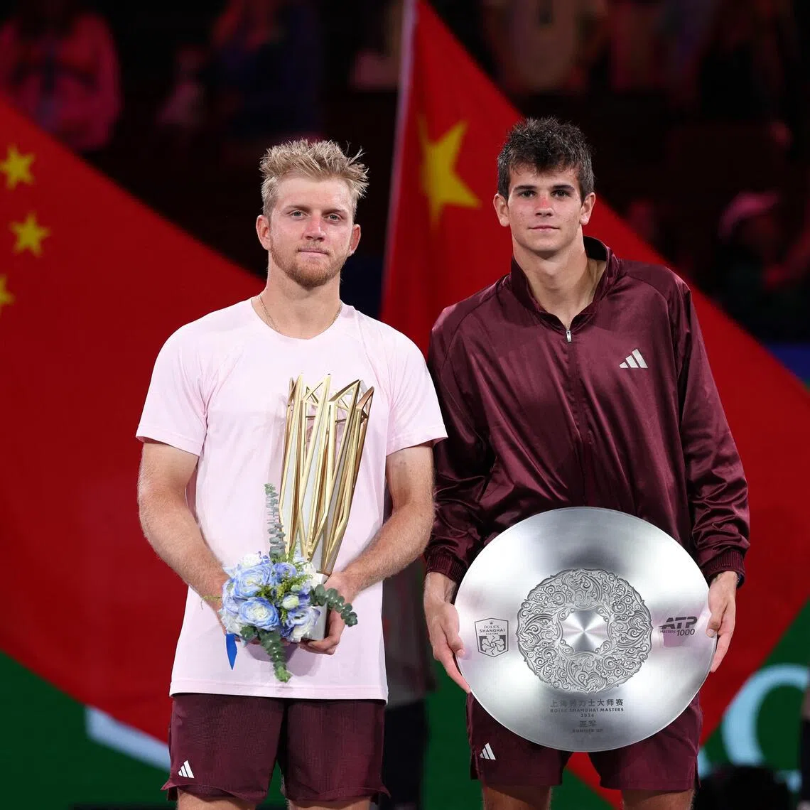 Alejandro Davidovich Fokina (left) celebrates with the winner’s trophy after beating his Spanish compatriot Rafael Jodar in the ATP Shanghai Masters final on Oct 18.