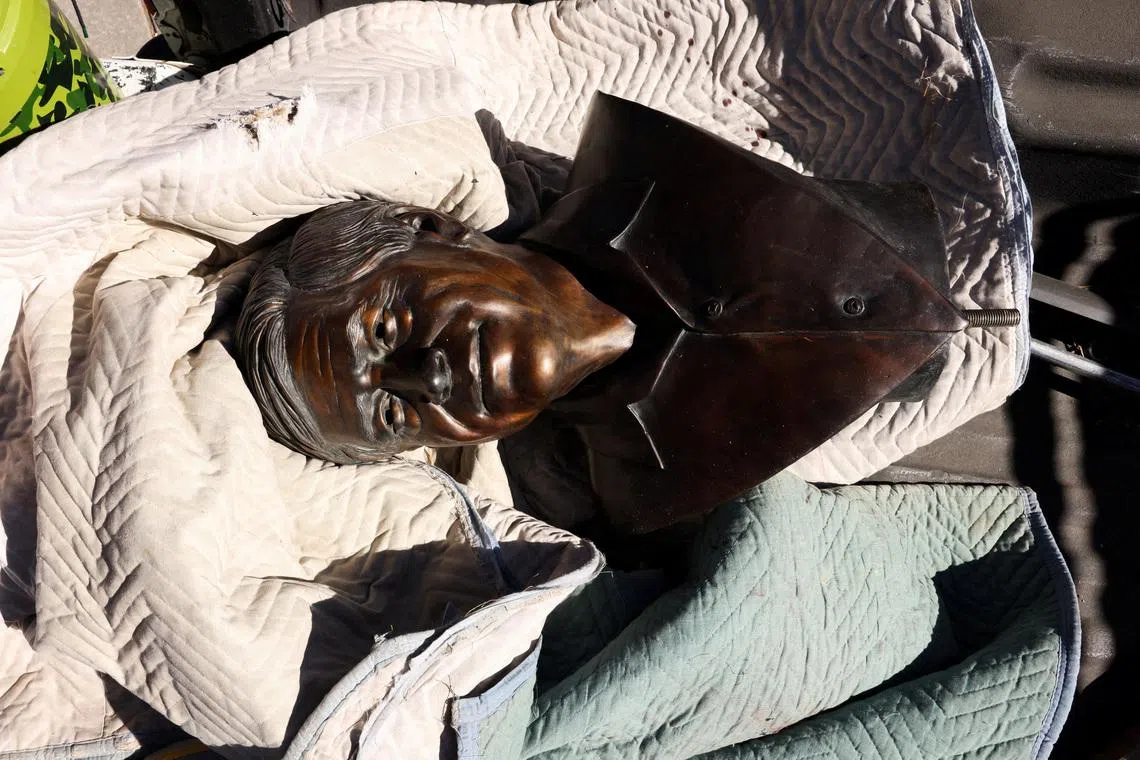 A bust of United Farm Workers union co-founder Cesar Chavez sits in the back of a Denver Parks and Recreation pickup truck following its removal from Cesar Chavez Park, after civil rights leader Dolores Huerta accused Chavez of sexually assaulting her in the 1960s, at Cesar Chavez Park in Denver, Colorado, U.S., March 19, 2026. REUTERS/Kevin Mohatt