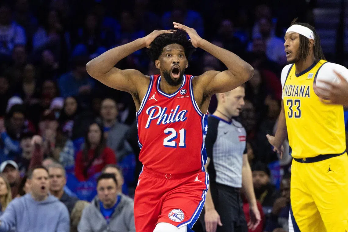 Dec 13, 2024; Philadelphia, Pennsylvania, USA; Philadelphia 76ers center Joel Embiid (21) reacts to a play against the Indiana Pacers during the first quarter at Wells Fargo Center. Bill Streicher-Imagn Images/File Photo