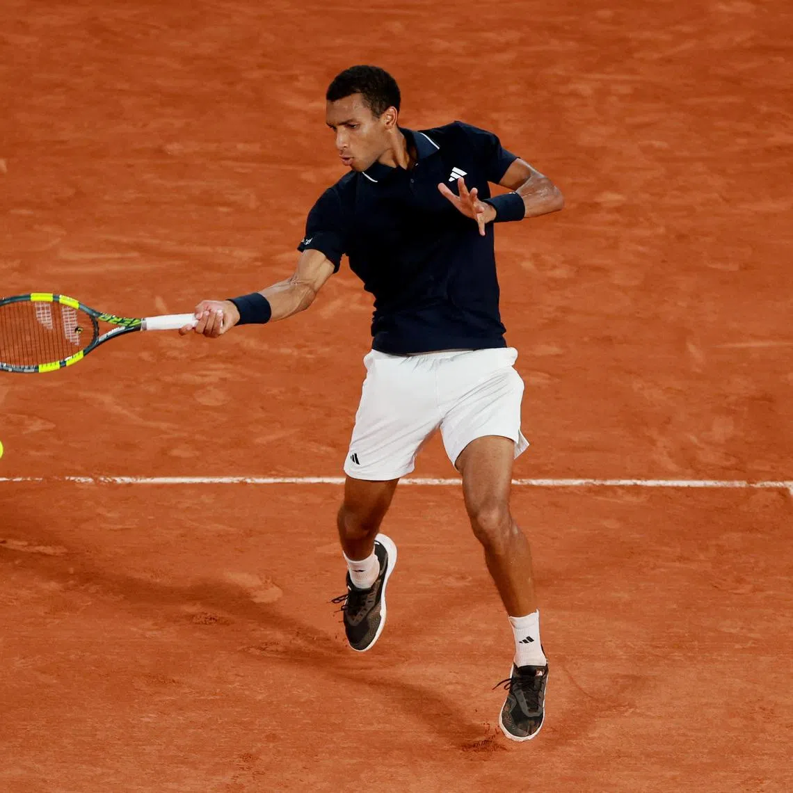 Tennis - French Open - Roland Garros, Paris, France - May 30, 2026 Canada's Felix Auger-Aliassime reacts during his third round match against Brandon Nakashima of the U.S. REUTERS/Stephanie Lecocq