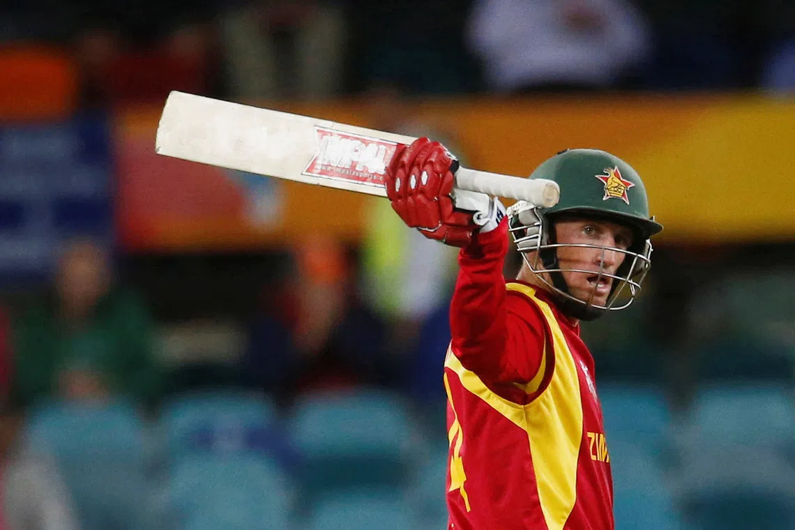 FILE PHOTO: Zimbabwe's batsman Sean Williams acknowledges his 50 runs during his World Cup Cricket match against the West Indies in Canberra, February 24, 2015.    REUTERS/David Gray/File Photo