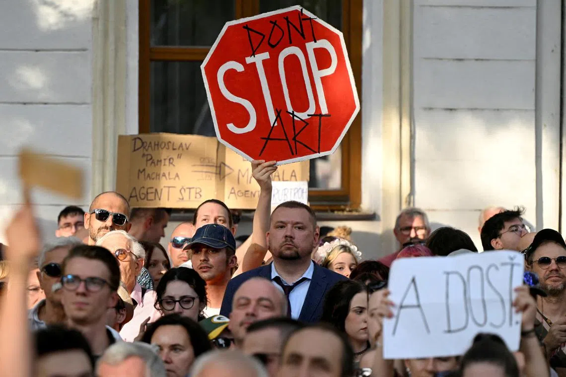 FILE PHOTO: Demonstrators attend an anti-government protest against recent moves by the government on justice and cultural issues, in Bratislava, Slovakia, August 13, 2024. REUTERS/Radovan Stoklasa/File Photo