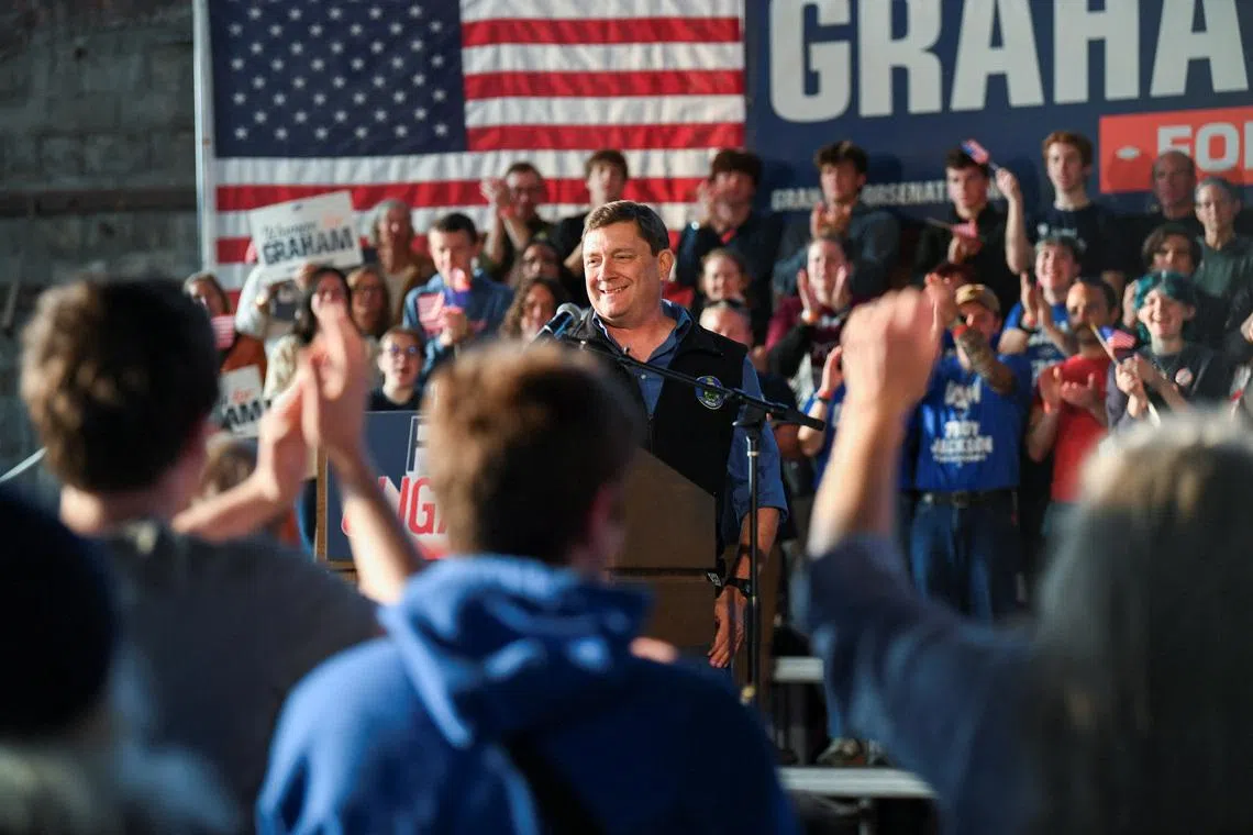 FILE PHOTO: Democratic candidate for governor Troy Jackson, of Maine, speaks during a \"Fighting Oligarchy\" campaign rally with U.S. Senator Bernie Sanders (I-VT) in Portland, Maine, U.S., May 25, 2026.   REUTERS/Amanda Sabga/ File Photo