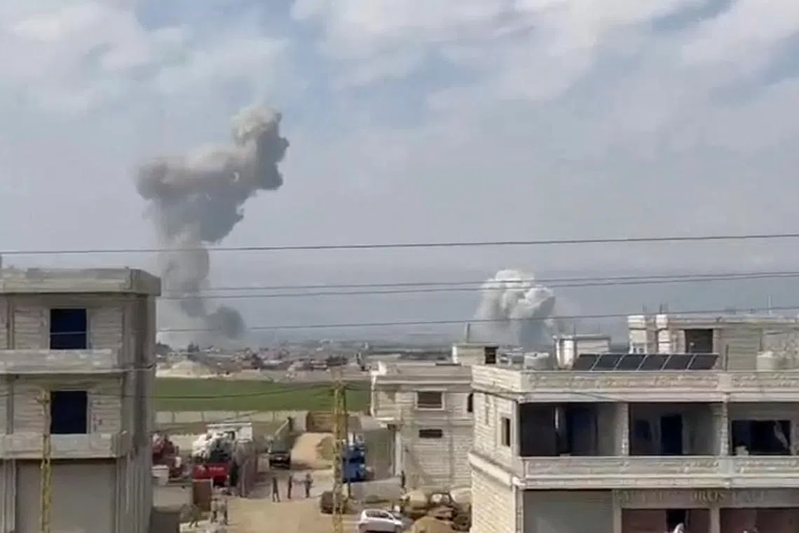 Clouds of smoke rise from Lebanon's Bekaa Valley, as sources in Lebanon reported Israeli airstrikes killed at least two Hezbollah members, February 26, 2024 in this still image taken from social media video via REUTERS