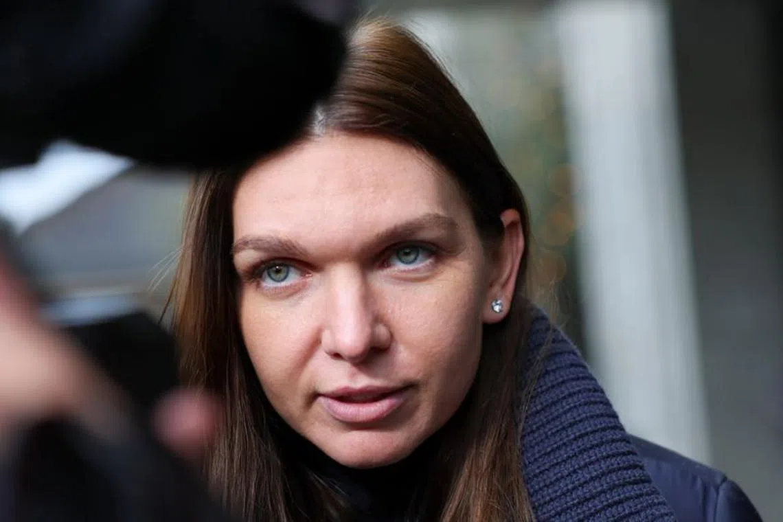 FILE PHOTO: Tennis player Simona Halep of Romania speaks to the media, after a hearing for a doping case against her, at the Court of Arbitration for Sport (CAS) in Lausanne, Switzerland February 9, 2024. REUTERS/Denis Balibouse/File Photo