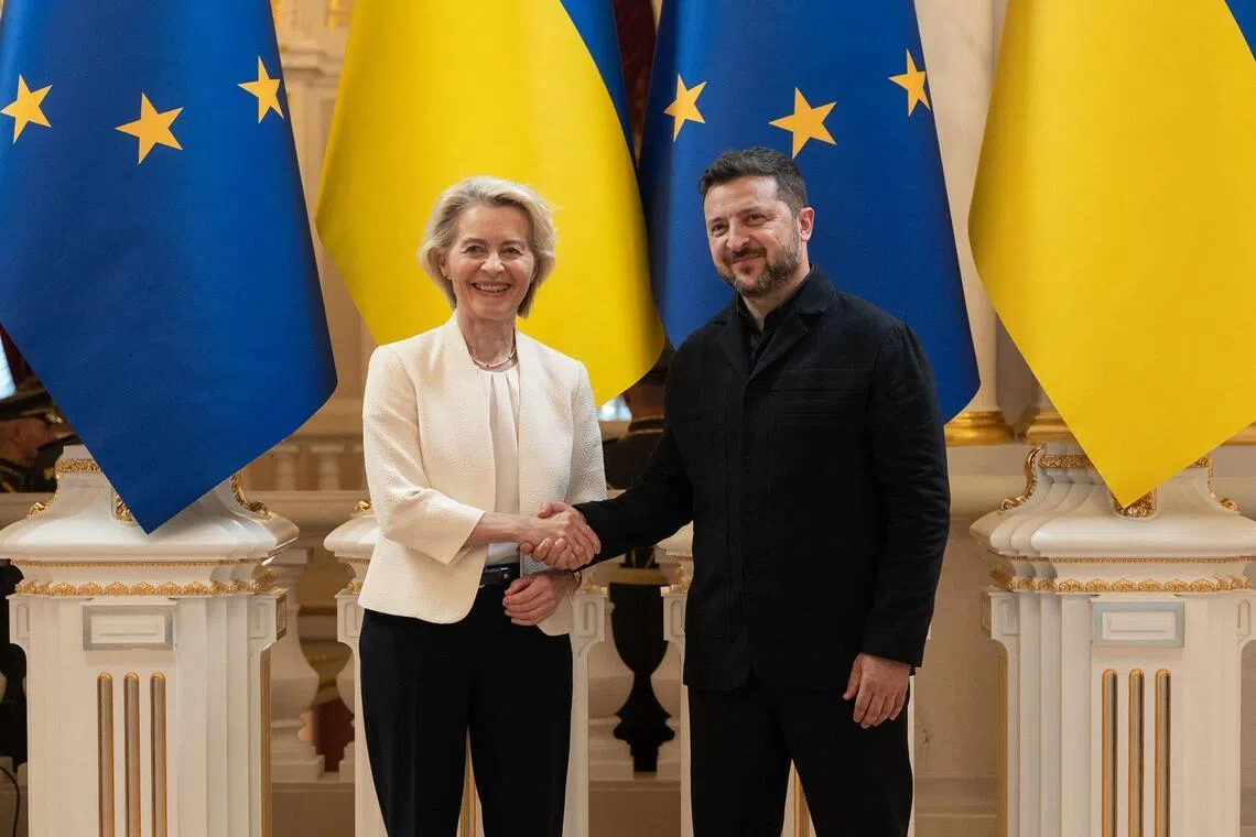 Ukrainian President Volodymyr Zelensky (right) shaking hands with European Commission president Ursula von der Leyen during their meeting in Kyiv on July 15.